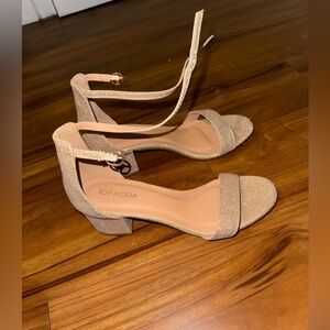 Worn only once for a wedding. Beautiful gold glitter sandals.